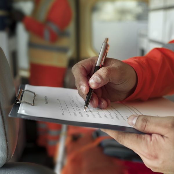 sided view hand filling document